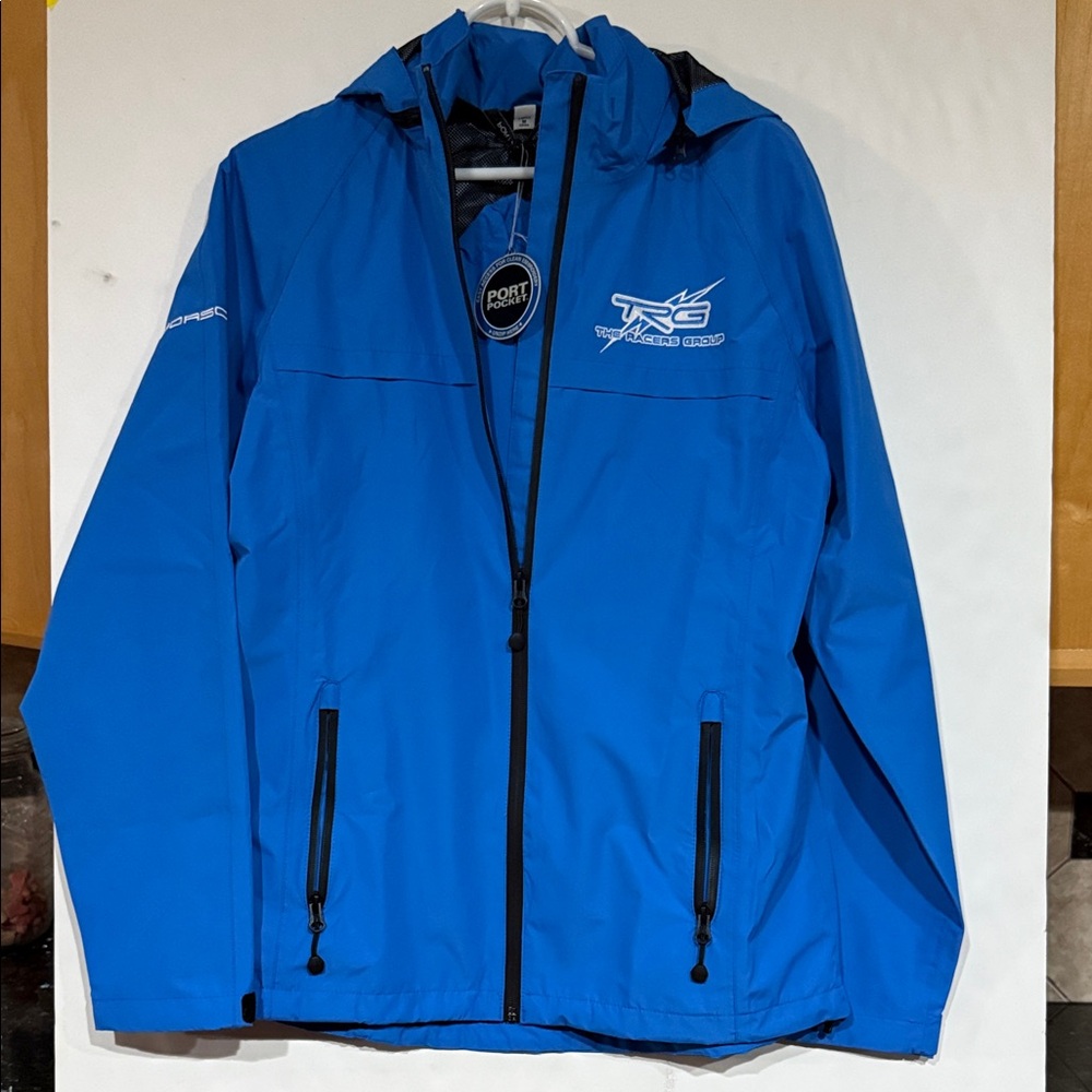 Brand new rain/windbreaker. Inside pocket/side zip pockets; medium.